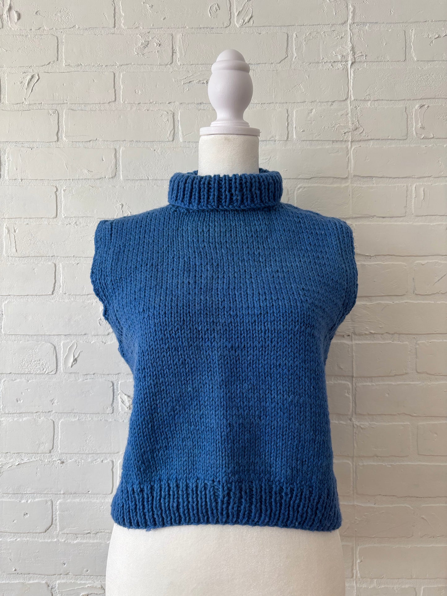 Blue knit sweater vest